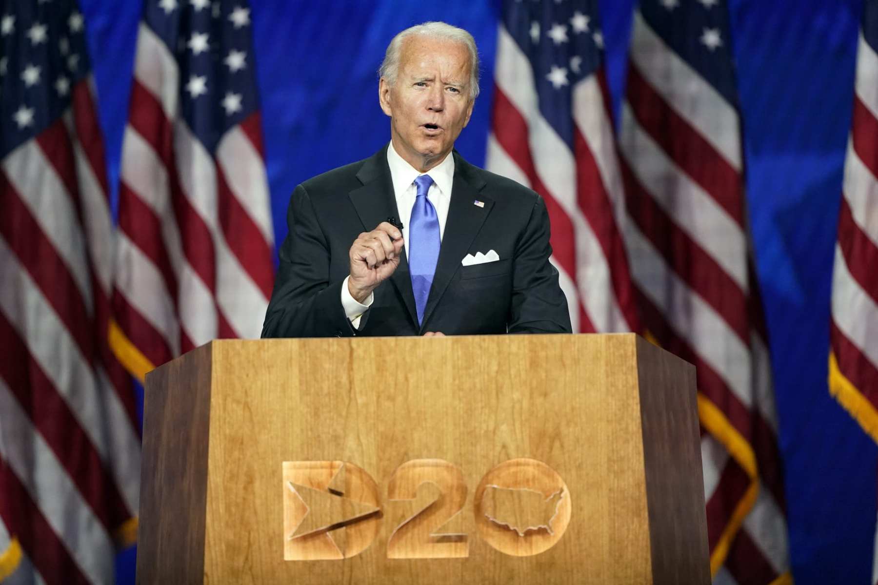 Joe Biden standing at a podium during the Democratic National Convention.