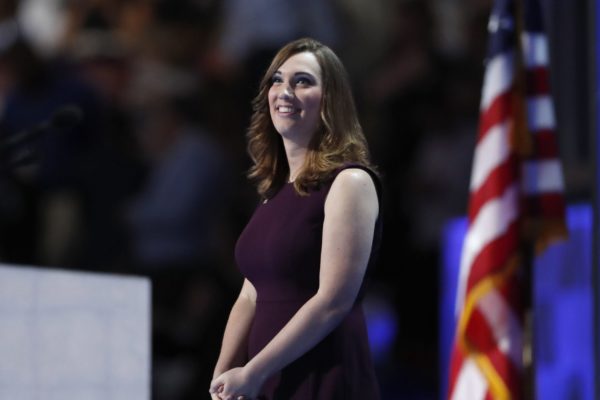 Sarah McBride stands on stage at the Democratic National Convention.