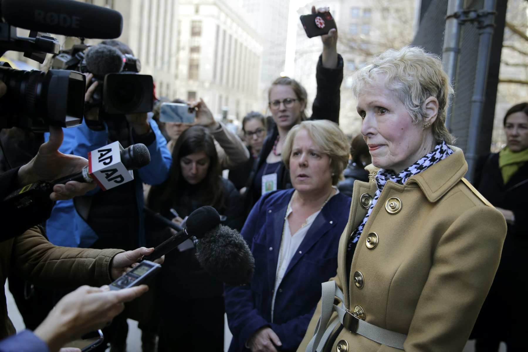 E Jean Carroll being interviewed by media.