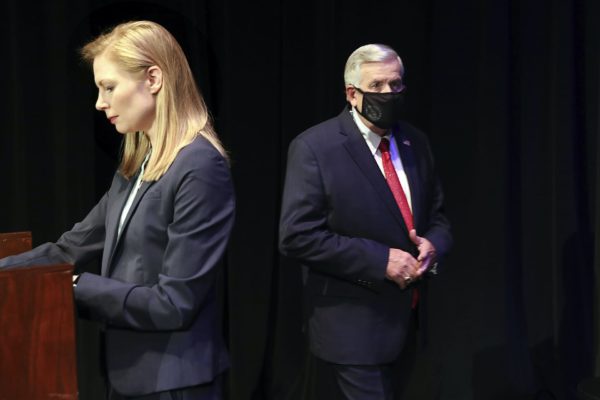 Missouri gubernatorial candidates, Gov. Mike Parson, and State Auditor Nicole Galloway are seen onstage before the Missouri gubernatorial debate at the Missouri Theatre on Friday, Oct. 9, 2020 in Columbia, Missouri. (Robert Cohen/St. Louis Post-Dispatch via AP, Pool)