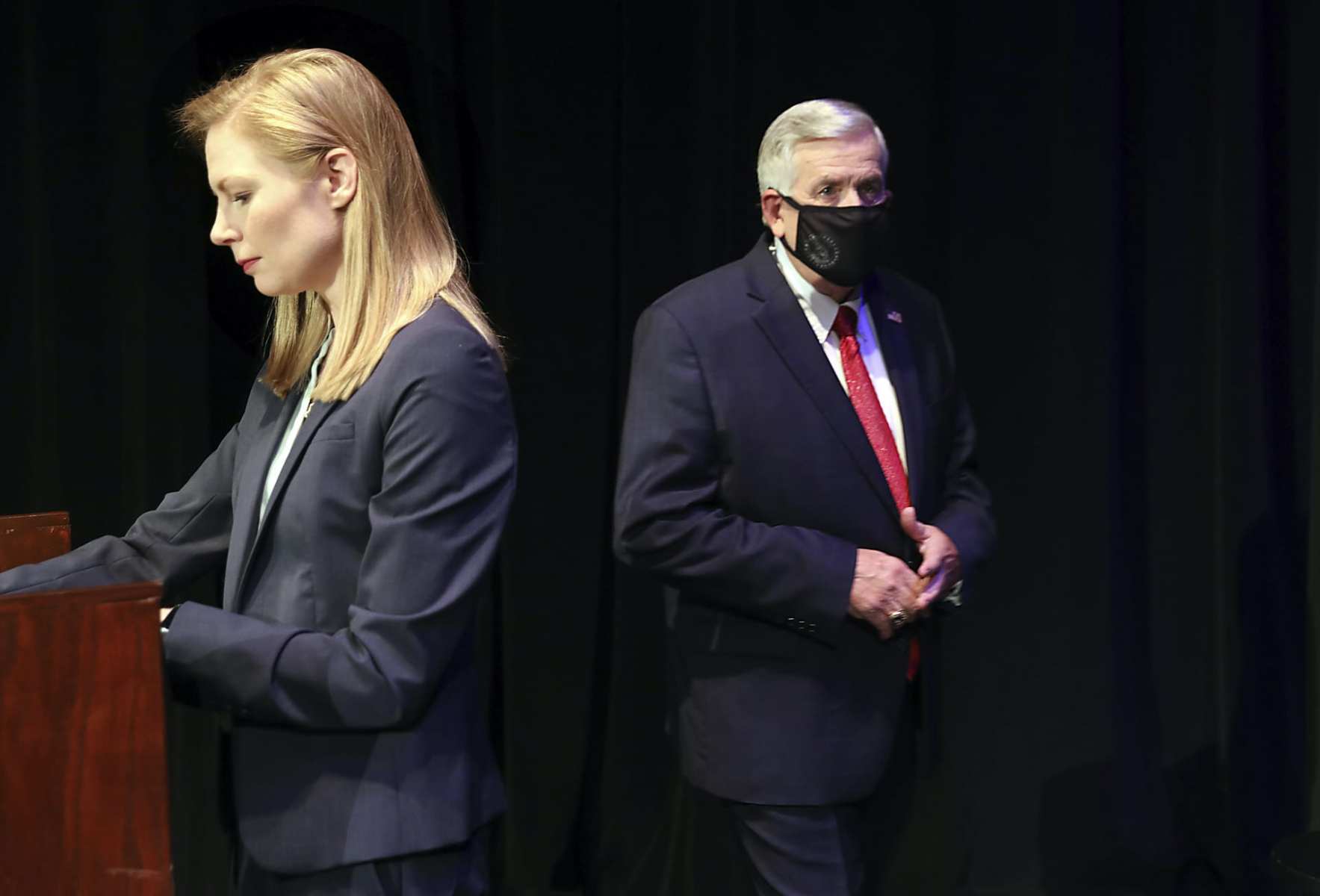 Missouri gubernatorial candidates, Gov. Mike Parson, and State Auditor Nicole Galloway are seen onstage before the Missouri gubernatorial debate at the Missouri Theatre on Friday, Oct. 9, 2020 in Columbia, Missouri. (Robert Cohen/St. Louis Post-Dispatch via AP, Pool)