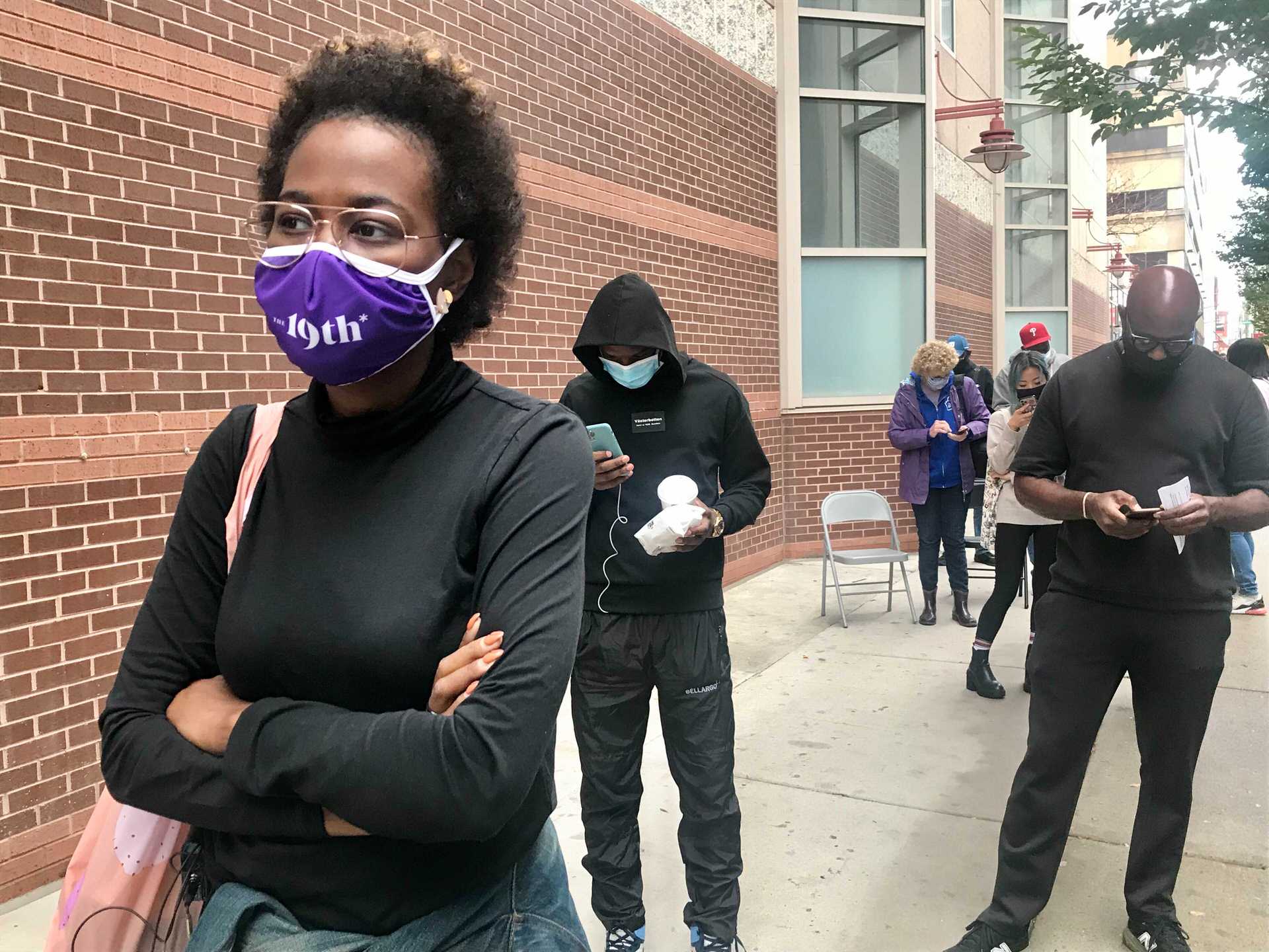 The 19th's editor at large Errin Haines standing in line to vote in the general election in Philadelphia.