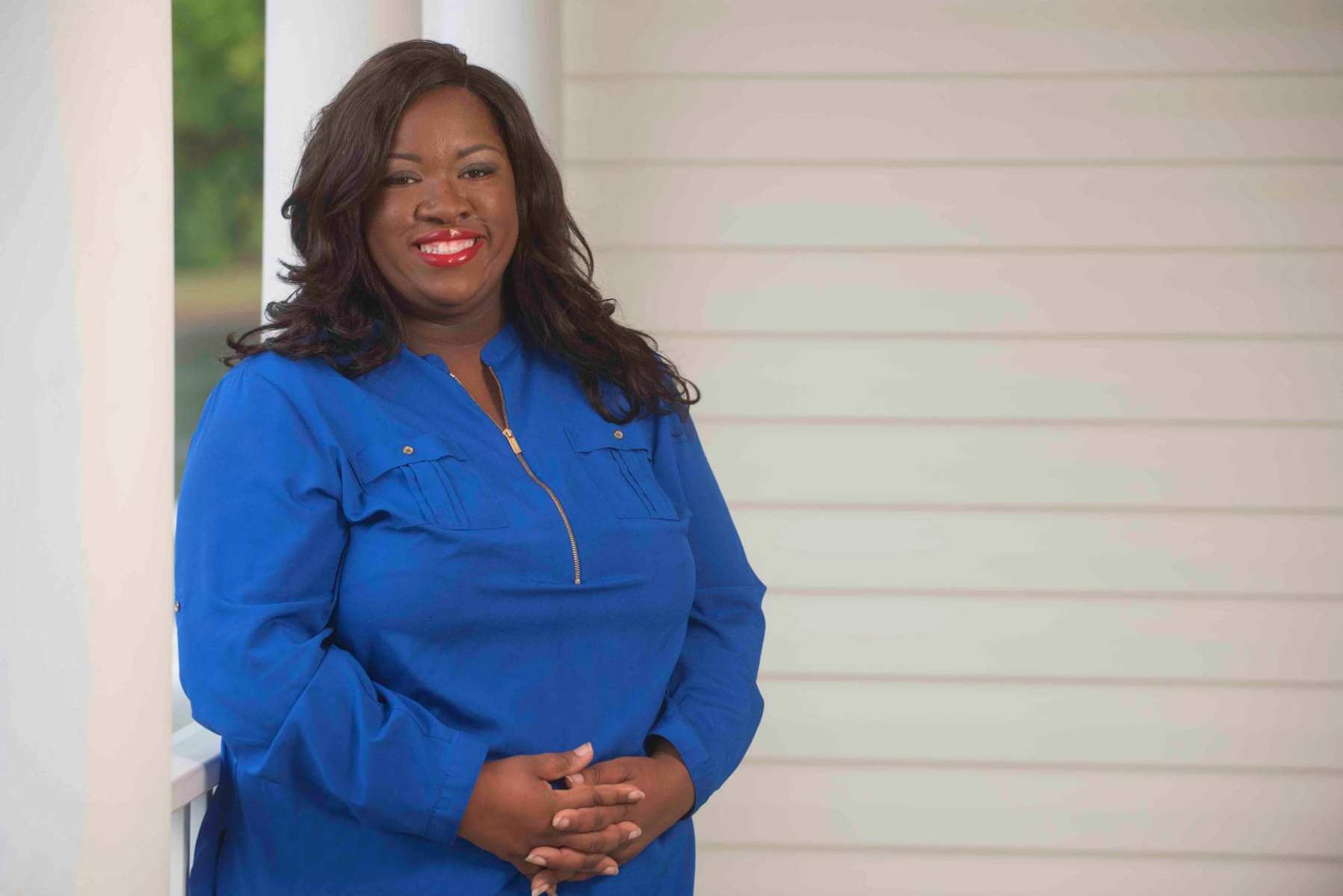 Candi King, photographed here in a blue outfit, won a special election the Virginia House of Delegates, bringing the total number of women in the state's General Assembly to 42, a record.