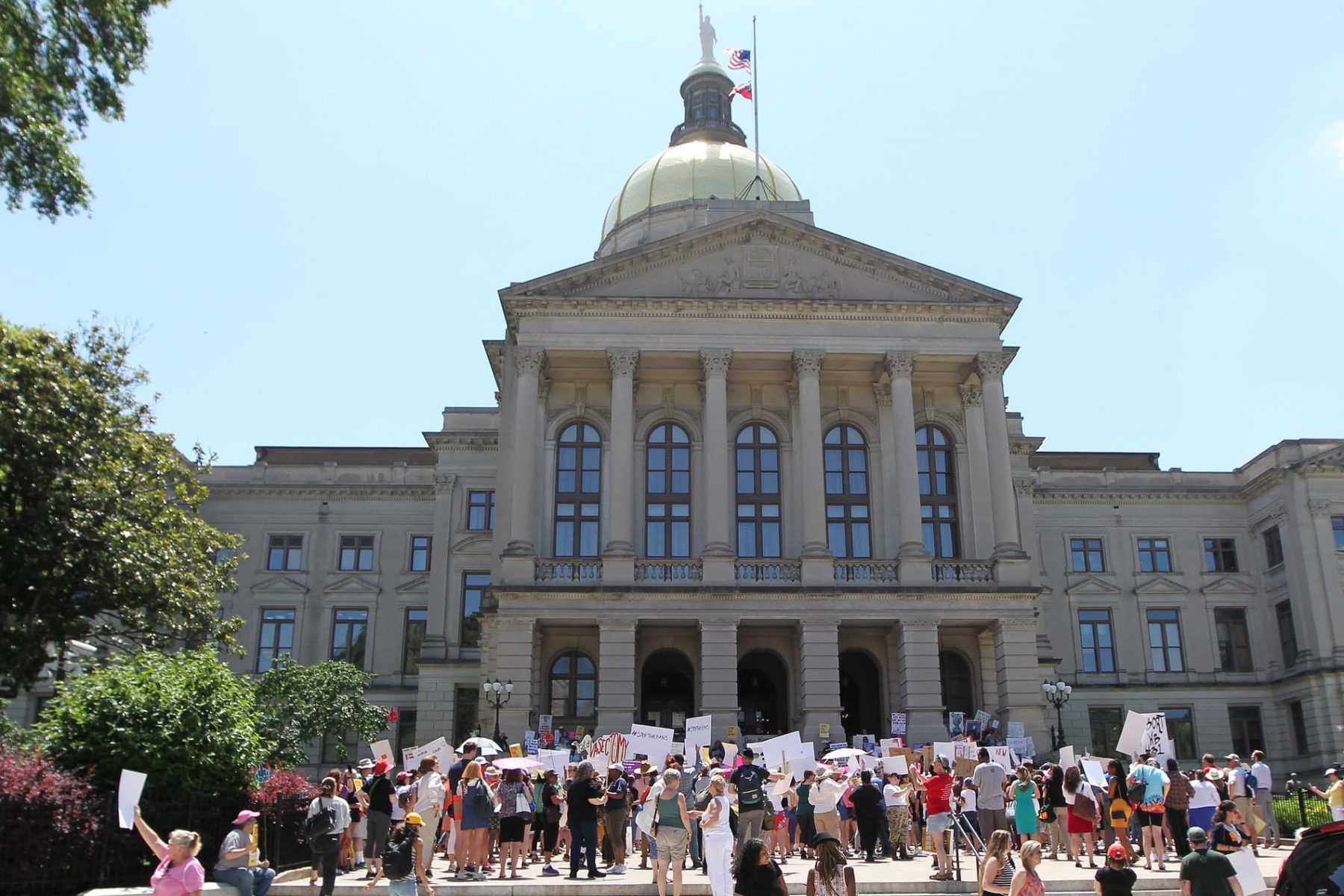 Abortion rights advocates rally in front of the Georgia State Capitol.