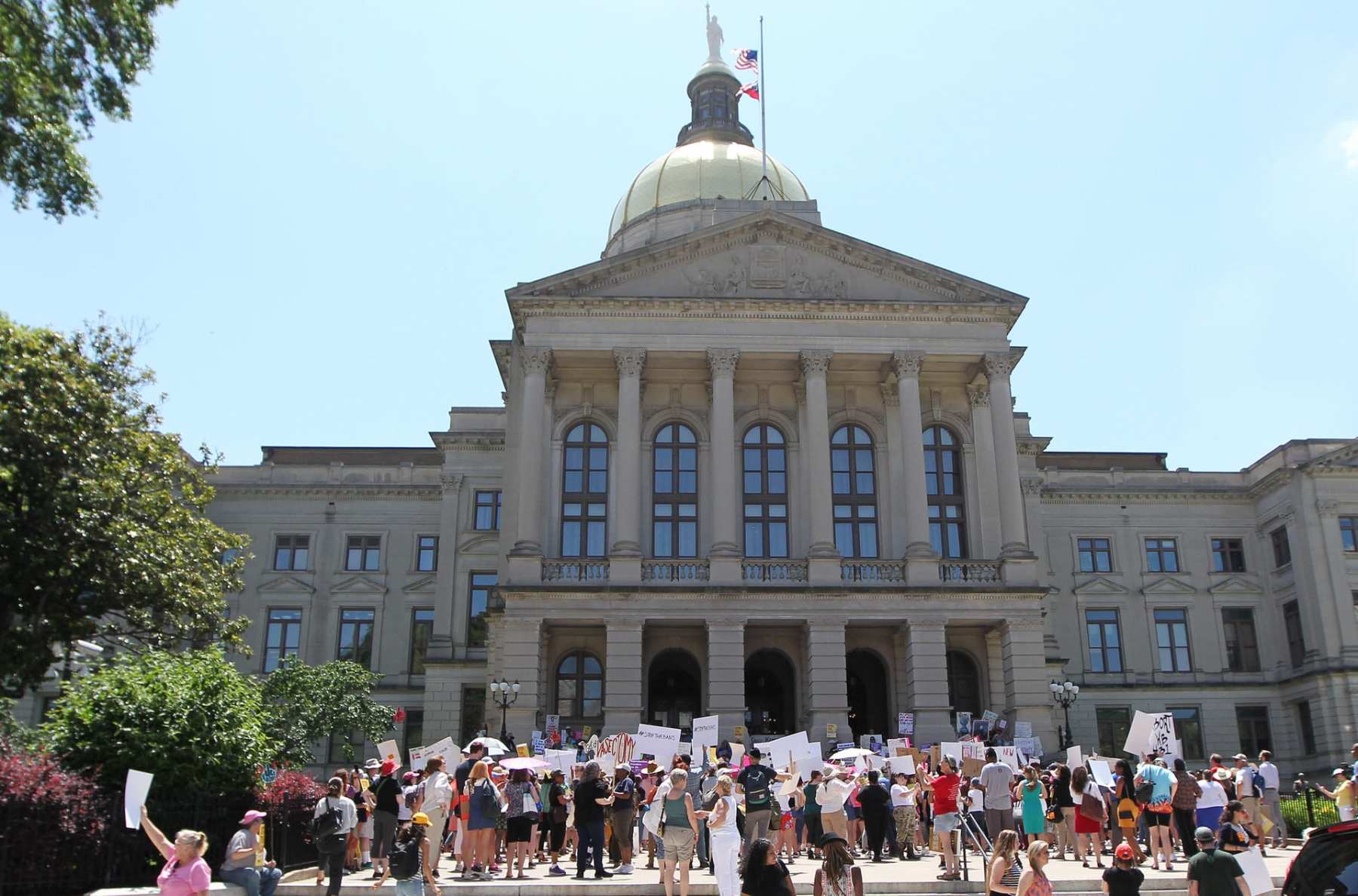 Abortion rights advocates rally in front of the Georgia State Capitol.