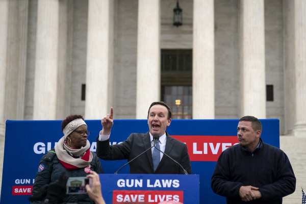 U.S. Sen. Chris Murphy (D-CT) speaks to gun safety advocates as they rally in front of the U.S. Supreme Court.