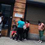 People wait in line for food assistance cards on July 07, 2020 in the Brooklyn borough of New York City.