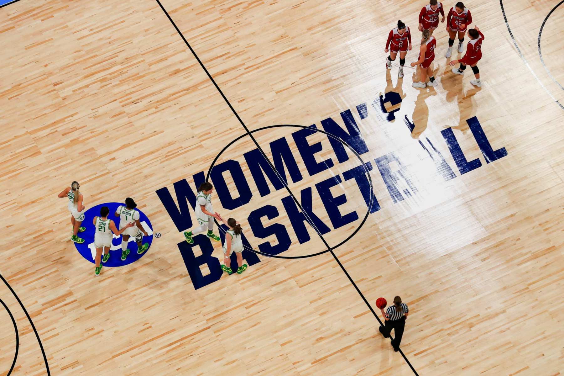 The South Dakota Coyotes and the Oregon Ducks in the first round game of the 2021 NCAA Women's Basketball Tournament at the Alamodome on March 22, 2021 in San Antonio, Texas.