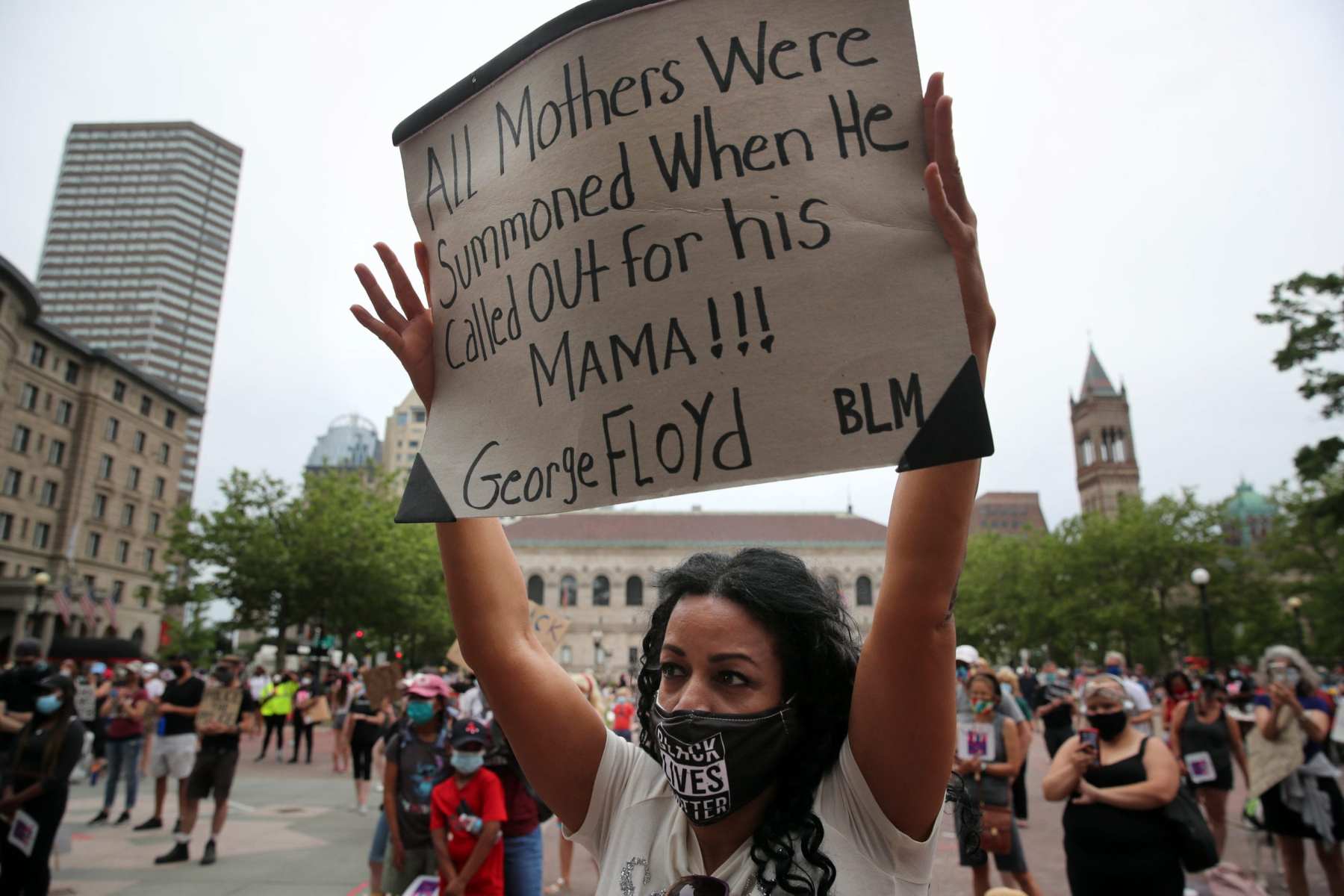 Shellee Mendes, a mother of three, raised her sign during the March Like A Mother for Black Lives rally at Copley Square in Boston, MA on June 27, 2020. Organizers say the peaceful, family-friendly event was created in response to the murders of George Floyd, Breonna Taylor, and Ahmaud Arbery to empower mothers to stand in solidarity against racism and anti-blackness while demanding radical systemic change.