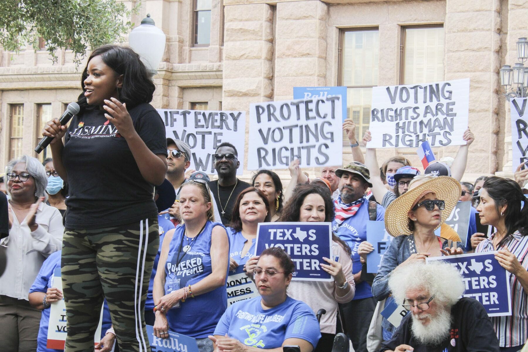 Representative Jasmine Crockett addresses the crowd at the For The People Rally in front of the Texas Capitol.