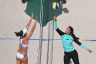Nada Meawad (R) from Egypt in action against Laura Giombini (L) from Italy during the Women's Preliminary Pool Beach Volleyball match.