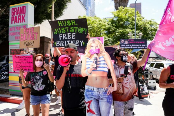 #FreeBritney protesters demonstrate in Los Angeles with a cardboard cutout of Britney Spears.
