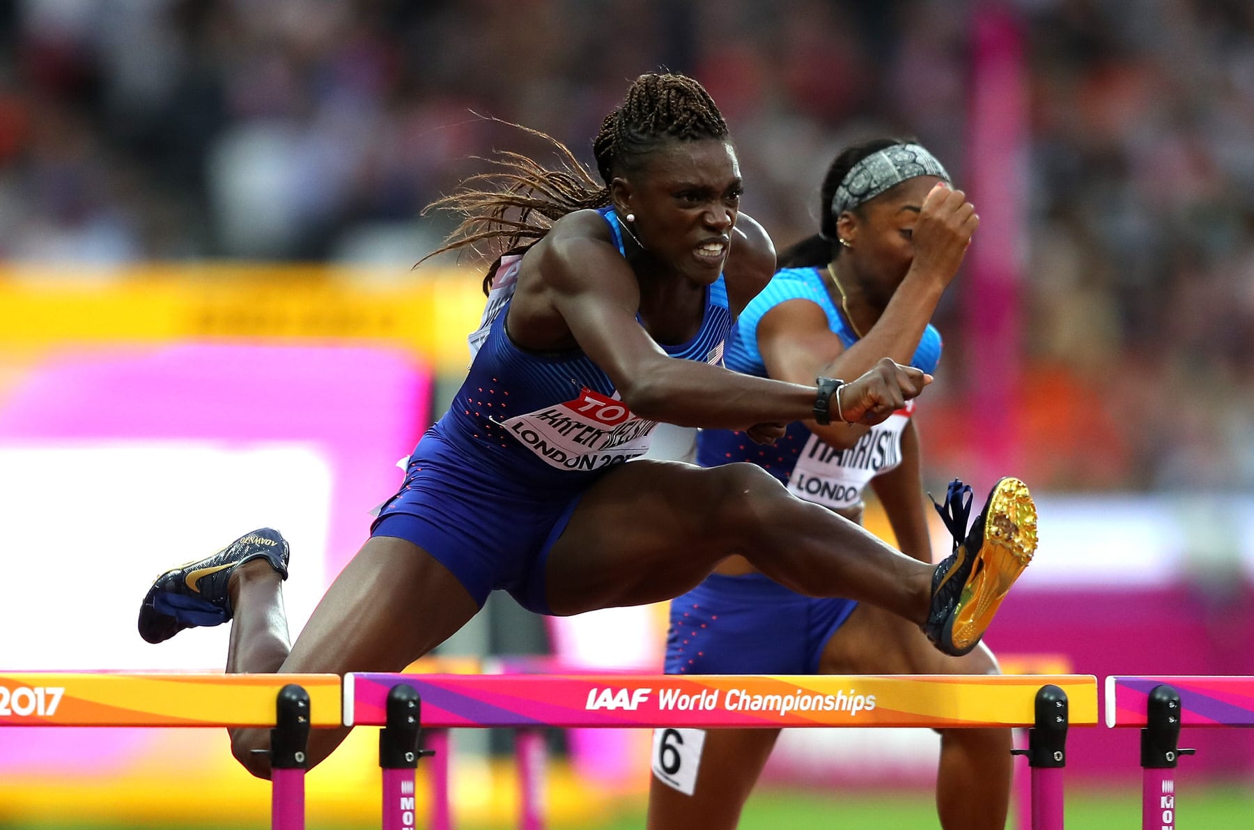 Dawn Harper-Nelson jumping over a hurdle.