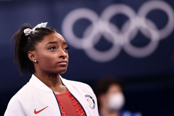 USA's Simone Biles looks on during the artistic gymnastics women's team final during the Tokyo 2020 Olympic Games at the Ariake Gymnastics Centre in Tokyo on July 27, 2021.