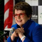 Billie Jean King speaking into a microphone.