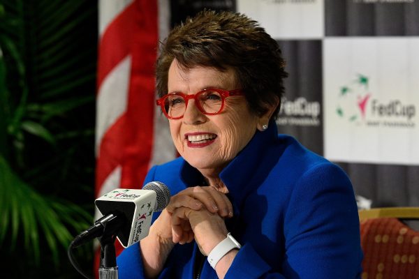 Billie Jean King speaking into a microphone.