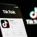A photo of a mobile phone with the TikTok app.