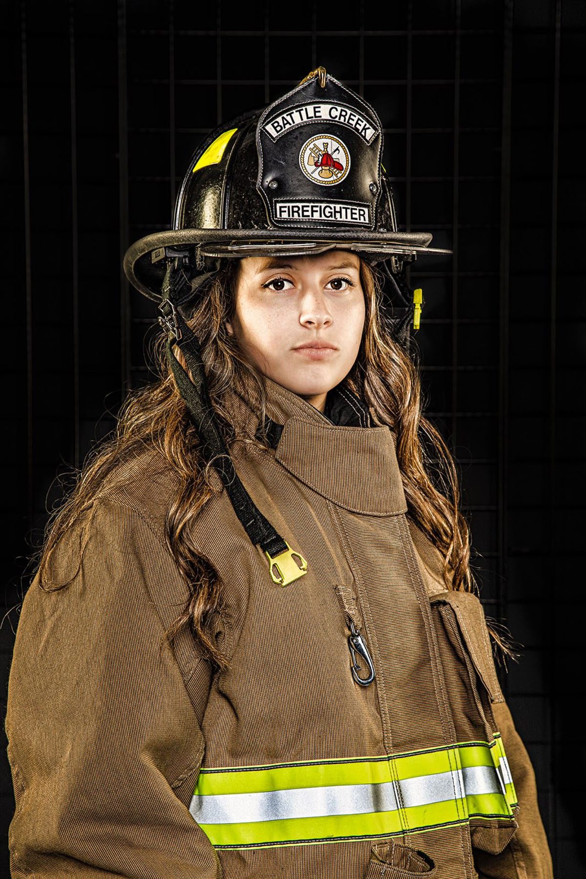 Katy Wolf wearing her uniform looks directly into the camera.