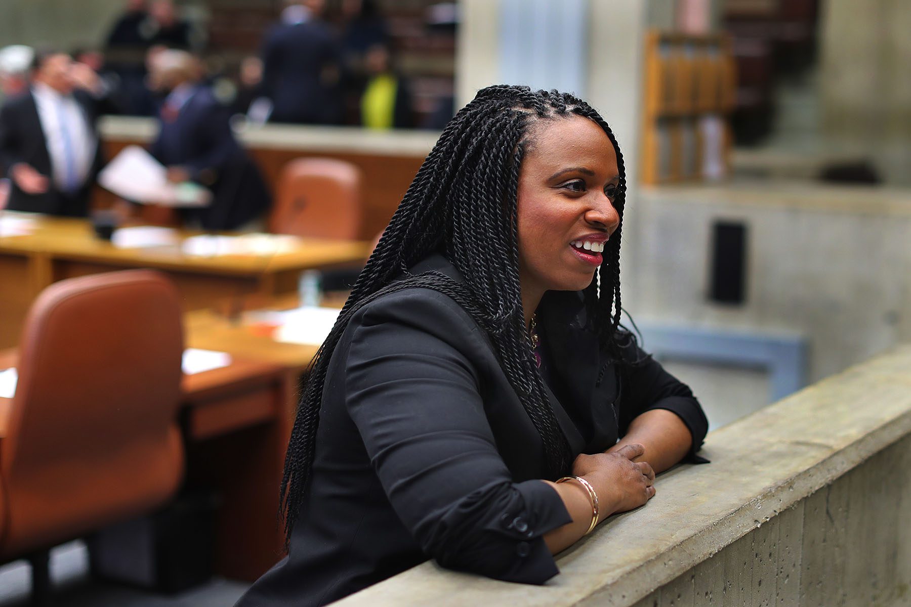 Ayanna Pressley chats before the city council meeting.