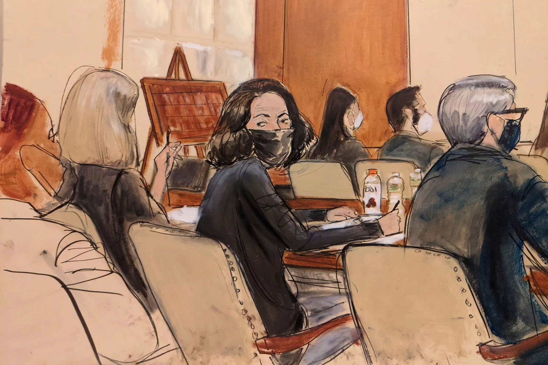 A courtroom sketch shows Maxwell looking over the shoulder at her trial.