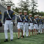 graduating cadets march to their graduation.