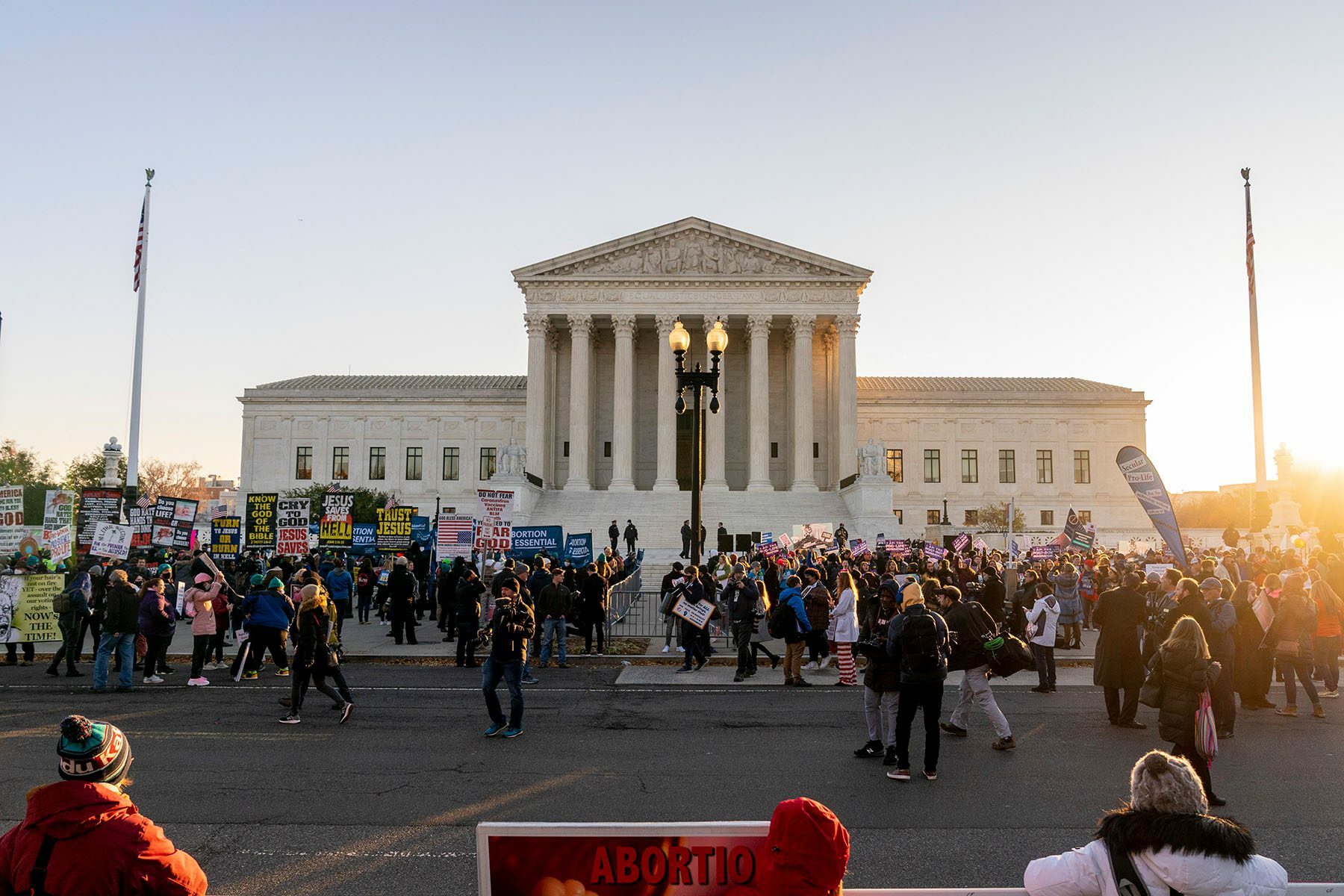 Protesters demonstrate in front of the U.S. Supreme Court.