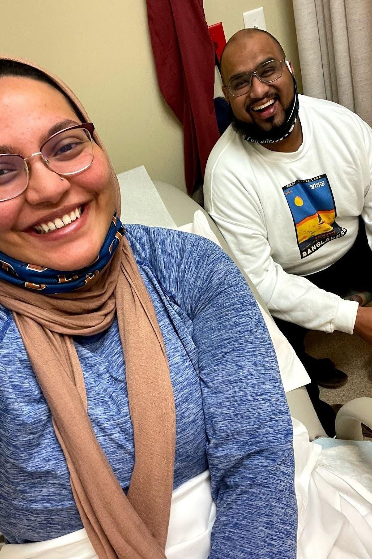 Nida Allam and her husband Towqir Aziz take a selfie at the fertility clinic.