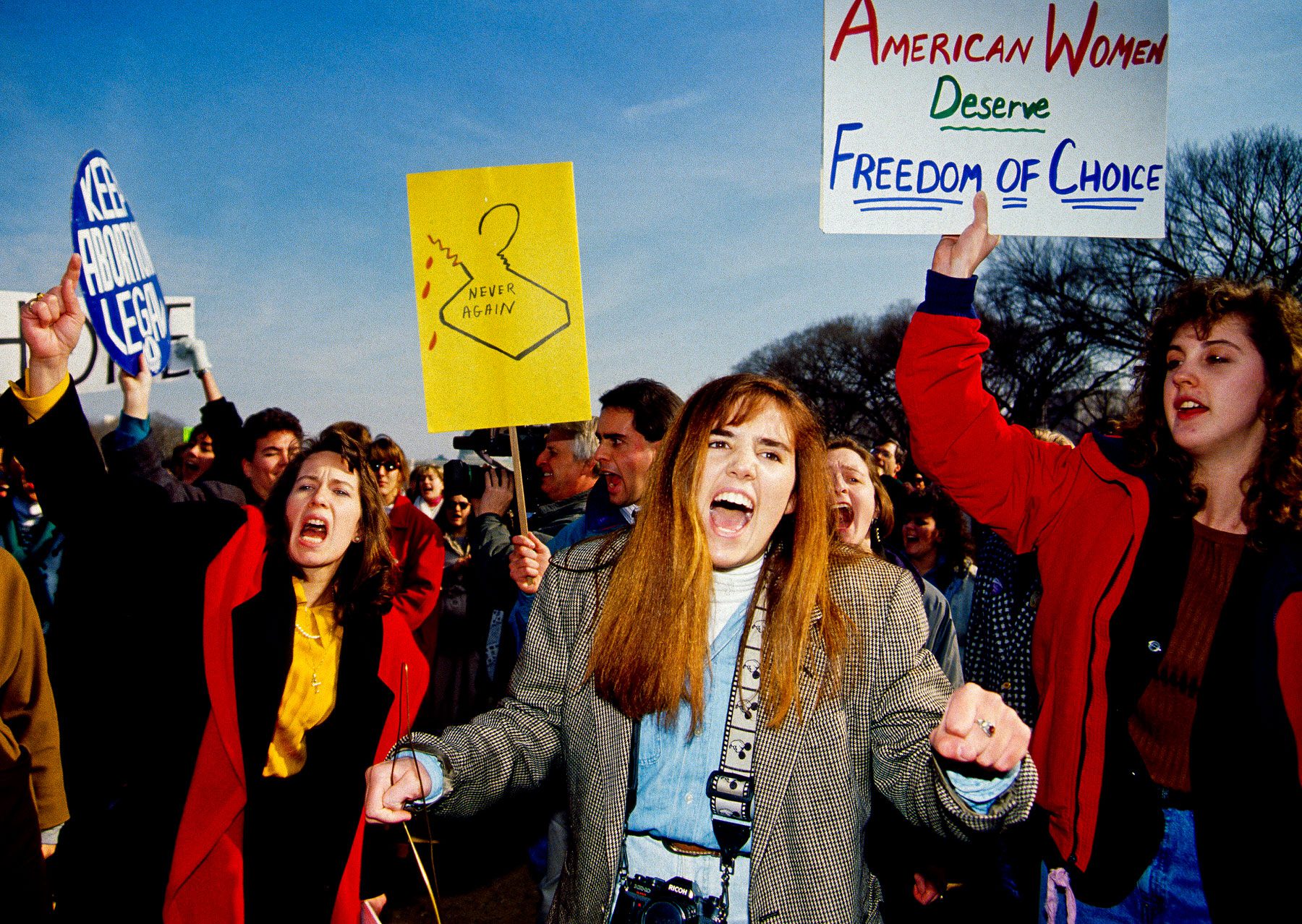 Abortion rights protesters hold signs in 1992.