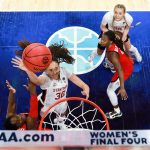 Players on the field at the NCAA Women's Basketball Tournament.