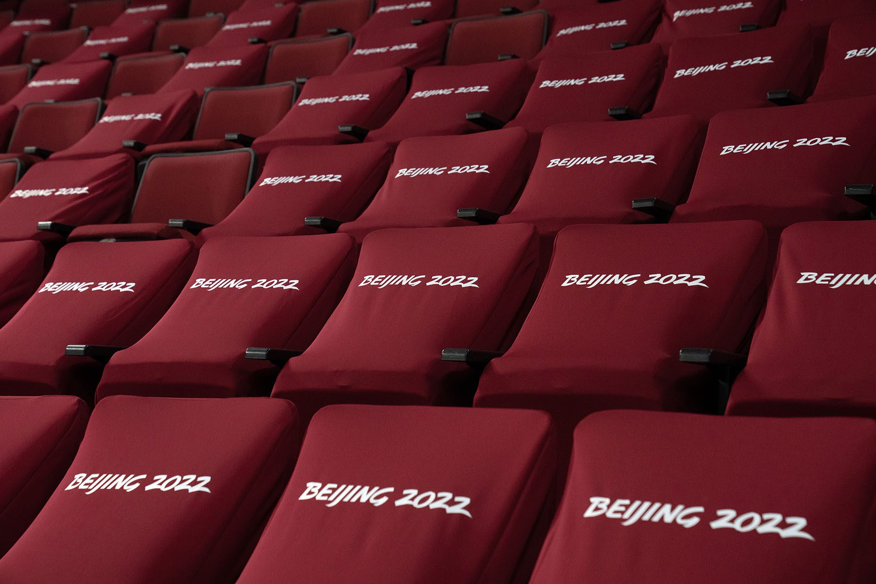 Seats with Beijing 2022 covers are pictured at Wukesong Arena.