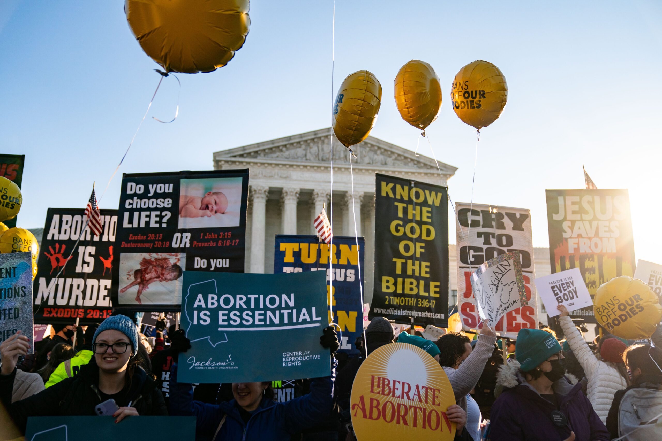 Abortion rights advocates and anti-abortion protesters demonstrate in front of the Supreme Court.