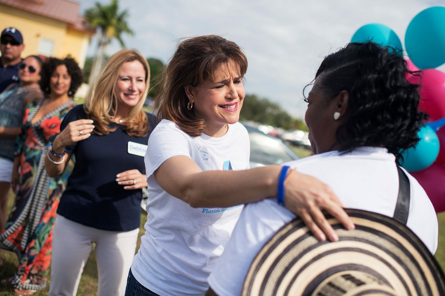 Annette Taddeo smiles as she speaks to a supporter.