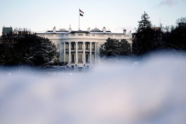Snow is piled up south of the White House.
