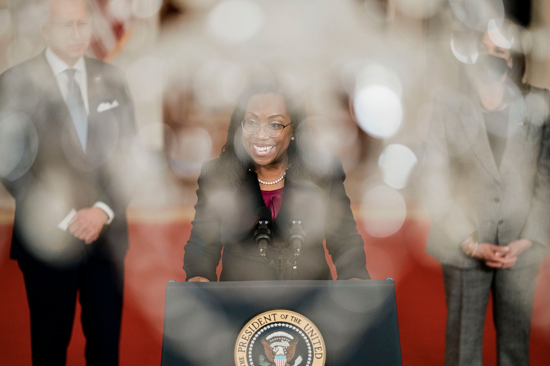 Flanked by President Biden and Vice President Harris, Judge Ketanji Brown Jackson delivers remarks on her nomination at the White House.