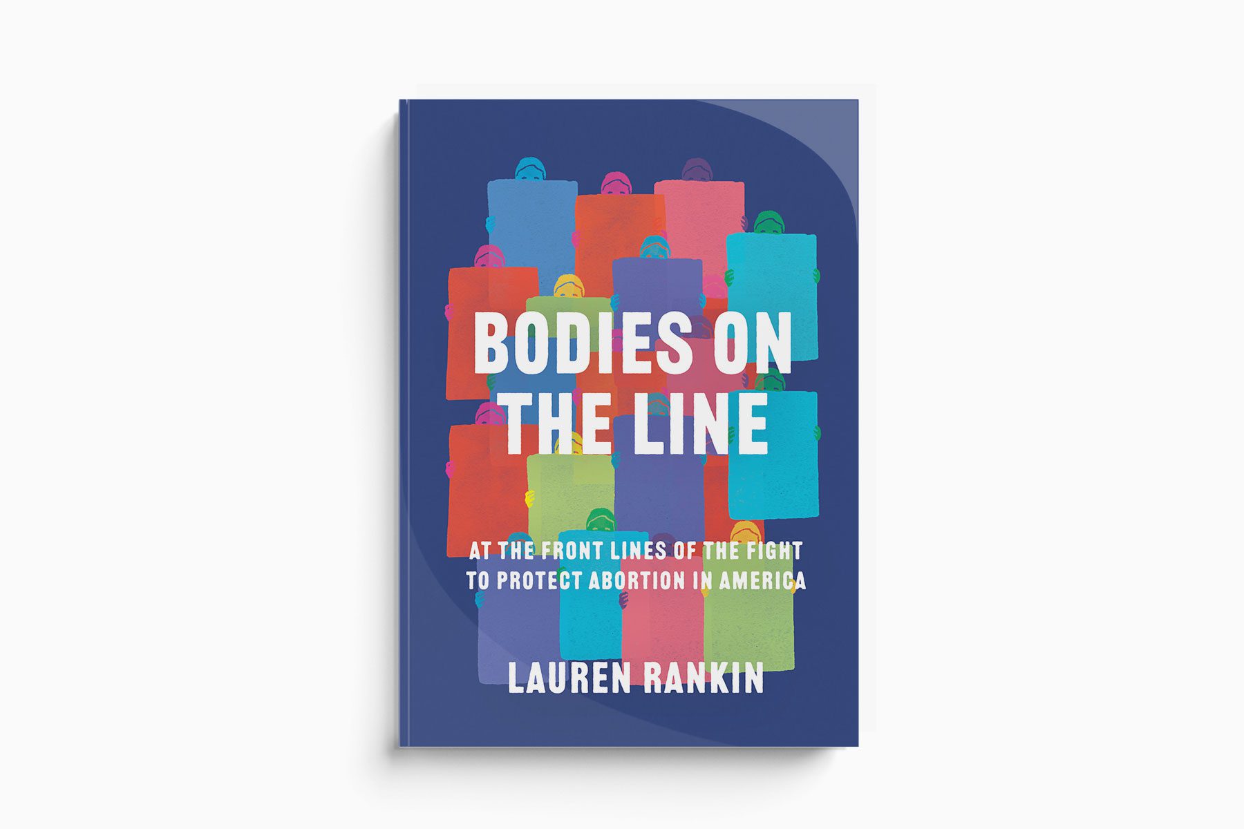 A purple book with the words “Bodies on the Line: At the Front Lines of the Fight to Protect Abortion in America" on the cover.