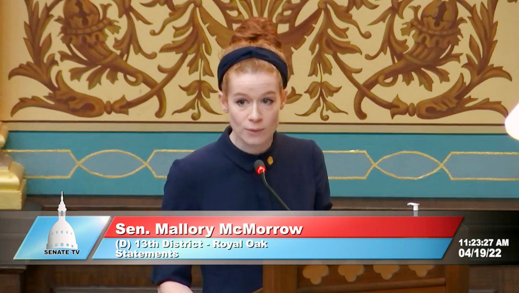 A screen grab of the viral speech in which Mallory McMorrow defends herself against false accusations made by a Republican colleague of hers. In the video, she is standing at a podium at the Michigan State Senate.