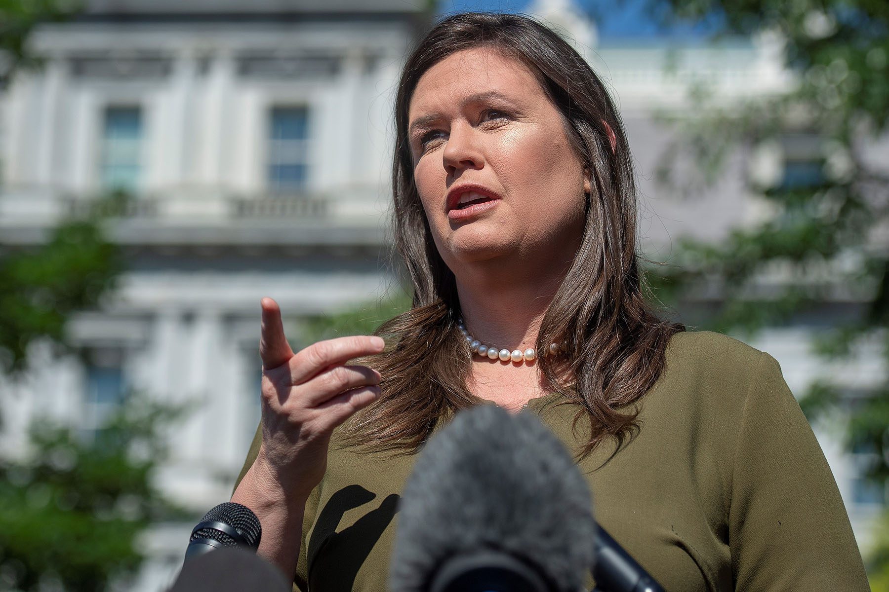 Sarah Huckabee Sanders speaks during a press conference at the White House