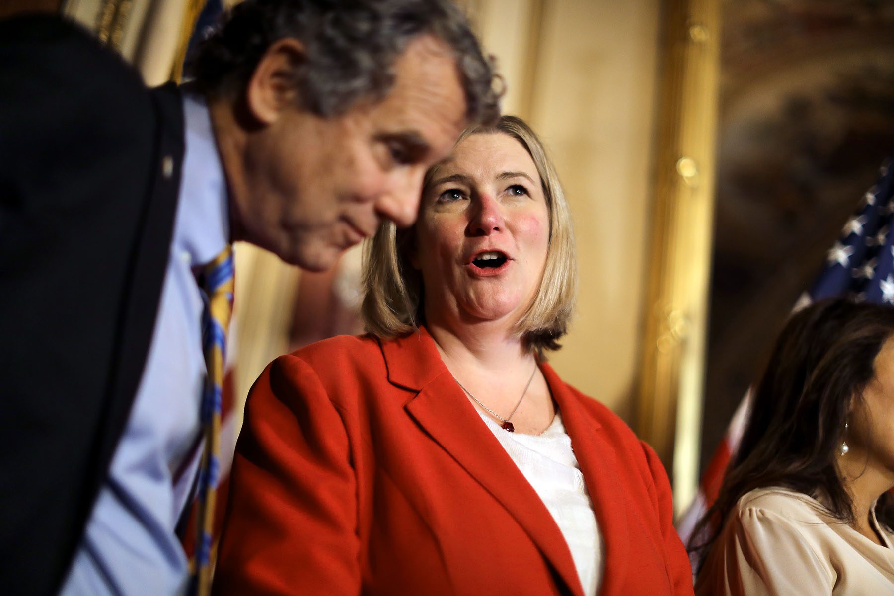Nan Whaley speaks to Sen. Sherrod Brown during a press conference on Capitol Hill.