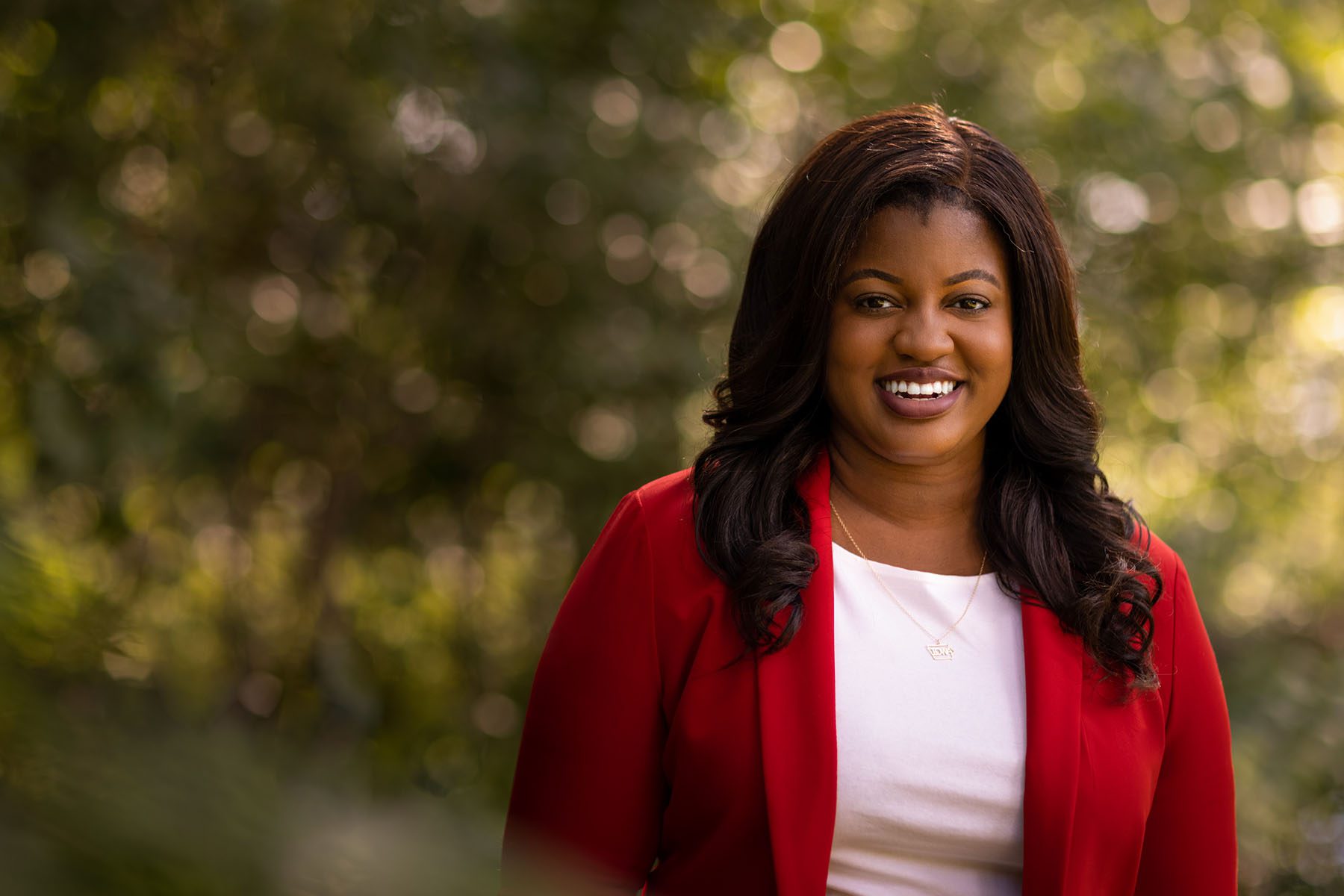 Deirdre DeJear smiles in this campaign headshot