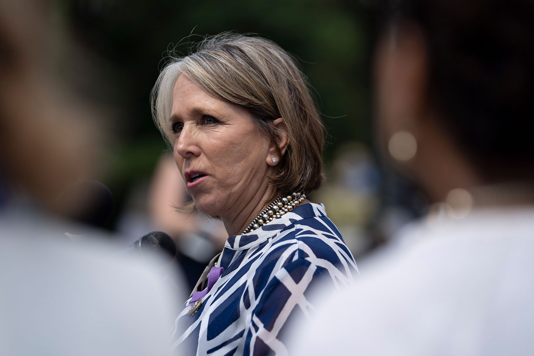 Michelle Lujan Grisham speaks during a news conference.