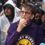 Mary Kay Henry speaks to workers at a rally outside of the Willis Tower headquarters of United Airlines.