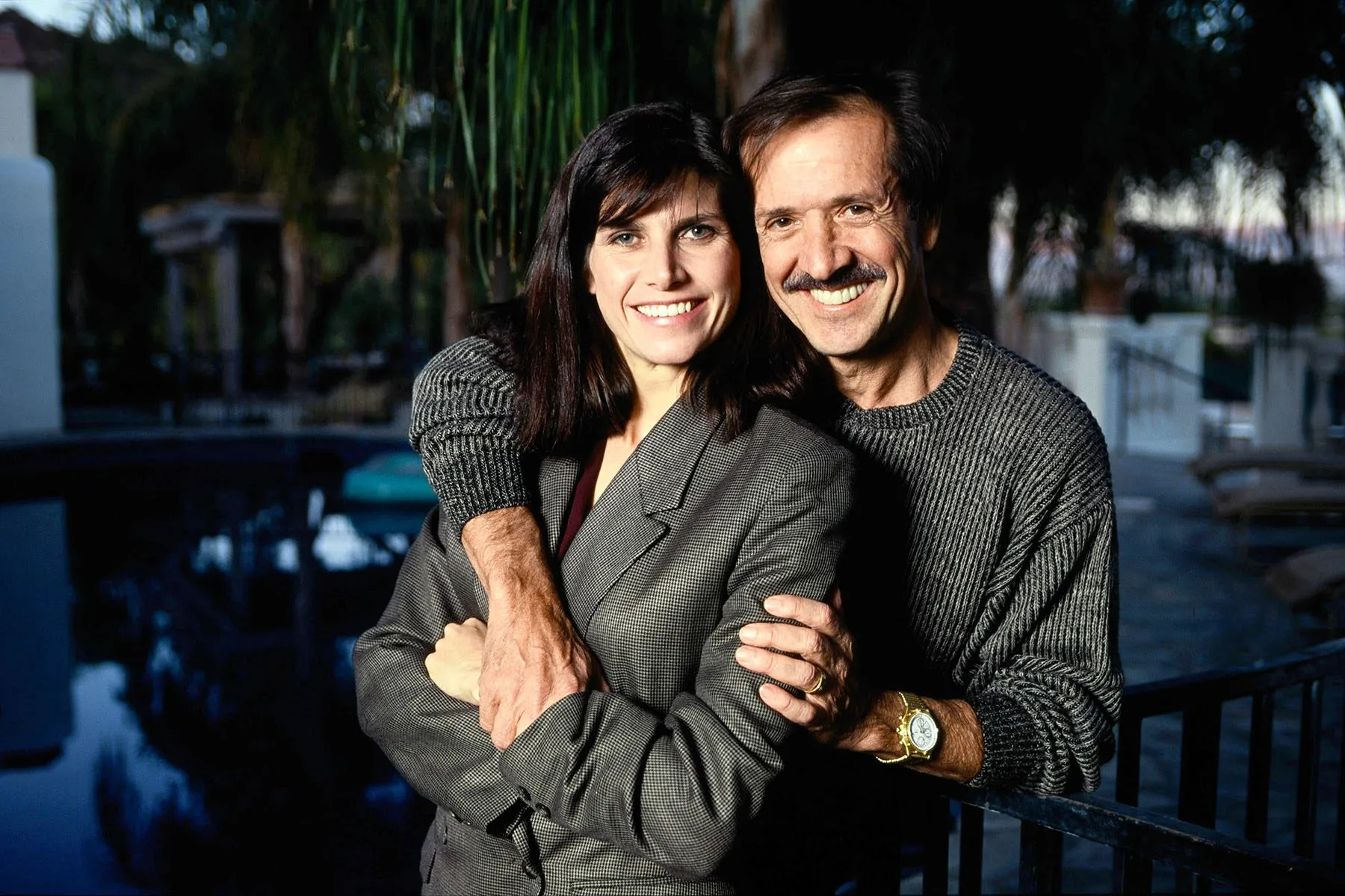 Sonny and Mary Bono hold each other as they pose for a portrait.