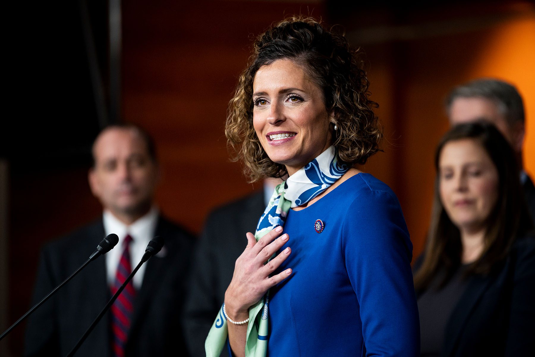 Rep. Julia Letlow speaks into a microphone during a press conference