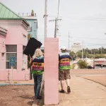 Clinic escorts outside an abortion clinic in Jackson, Mississippi