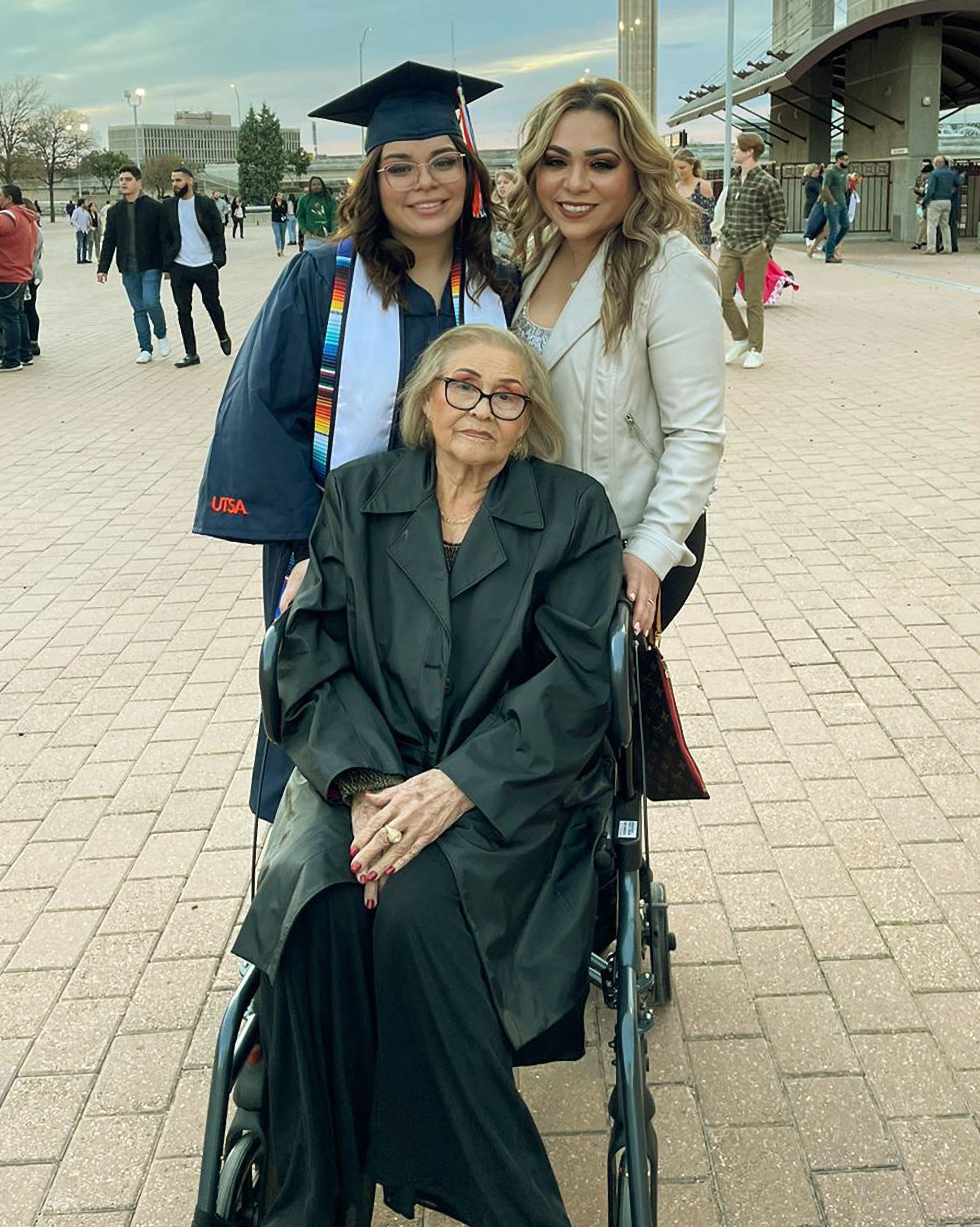 Jacqueline recreates her mom's graduation photo at her own graduation, with her mom and grandmother.