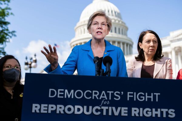 Tammy Duckworth (left) Elizabeth Warren and Maria Cantwell conduct a news conference outside the U.S. Capitol in support of reproductive rights.