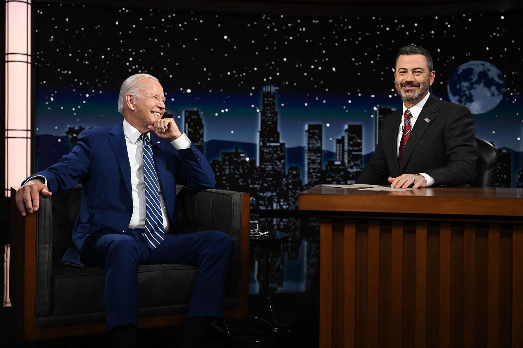 President Biden sits next to Jimmy Kimmel as he makes his first in-person appearance on "Jimmy Kimmel Live!"