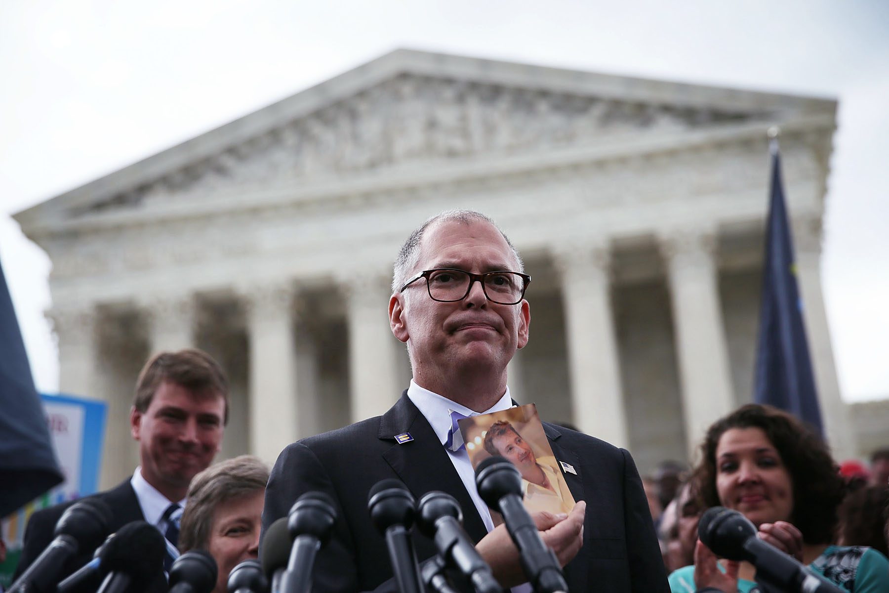 Plaintiff Jim Obergefell holds a photo of his late husband John Arthur as he speaks to members of the media in front of the Supreme Court