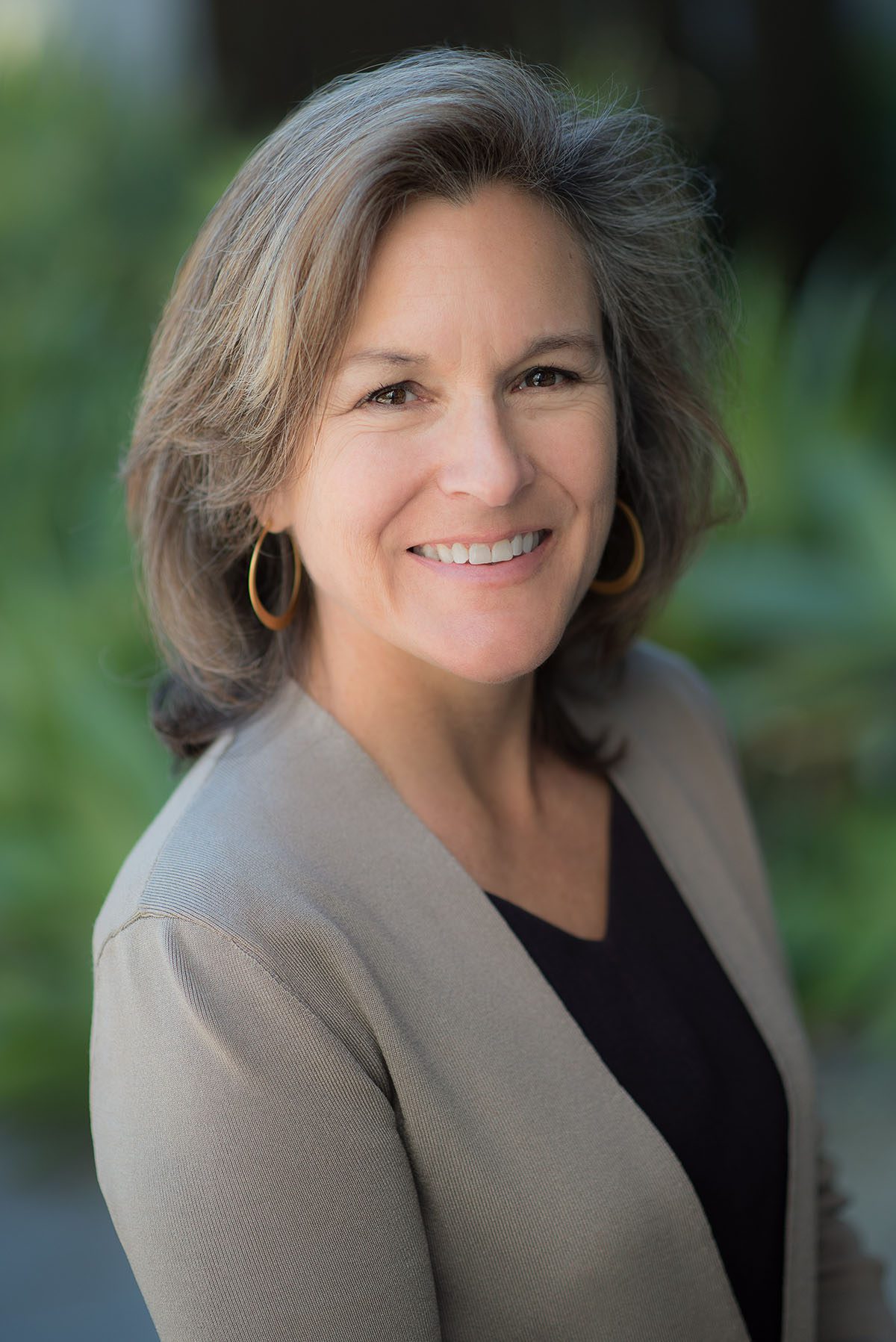 Portrait of Tracey Woodruff smiling