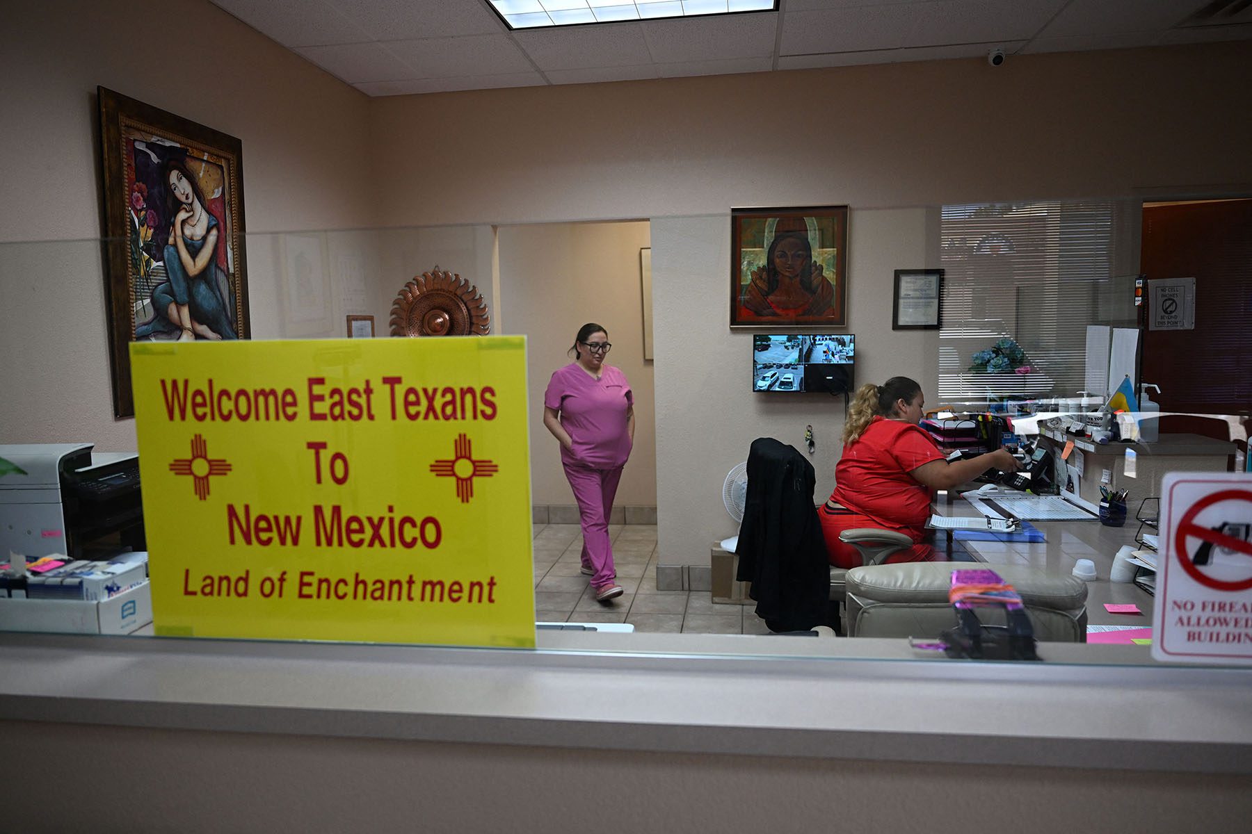 A sign welcoming patients from East Texas is displayed in the waiting area of the Women's Reproductive Clinic in Santa Teresa, New Mexico.